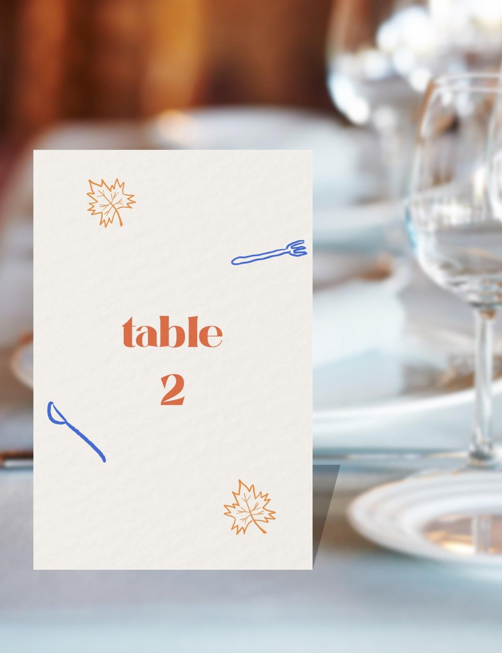 table number card with maple leave and dinning party items doodle canada theme destination wedding